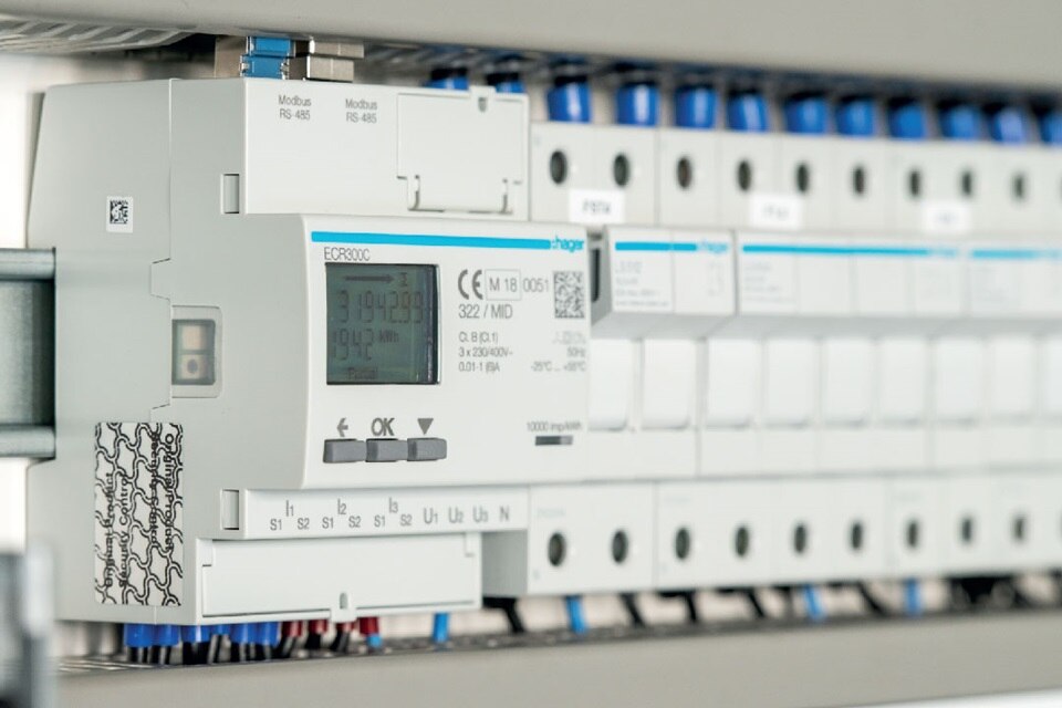 Hager energy meter and modular devices on a DIN rail in an electrical panel