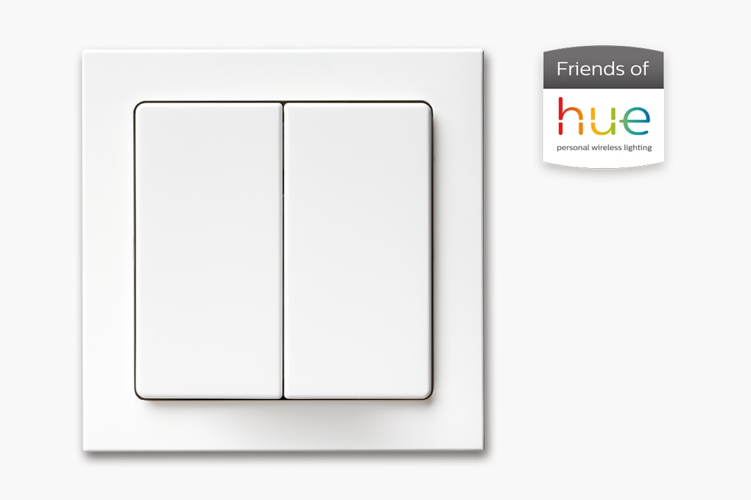 Frontalansicht Berker Q.1 Lichtschalter mit 2-fach Wippe und Rahmen in Weiß, daneben Emblem Friends of Hue für Kompatibilität mit Philips Hue