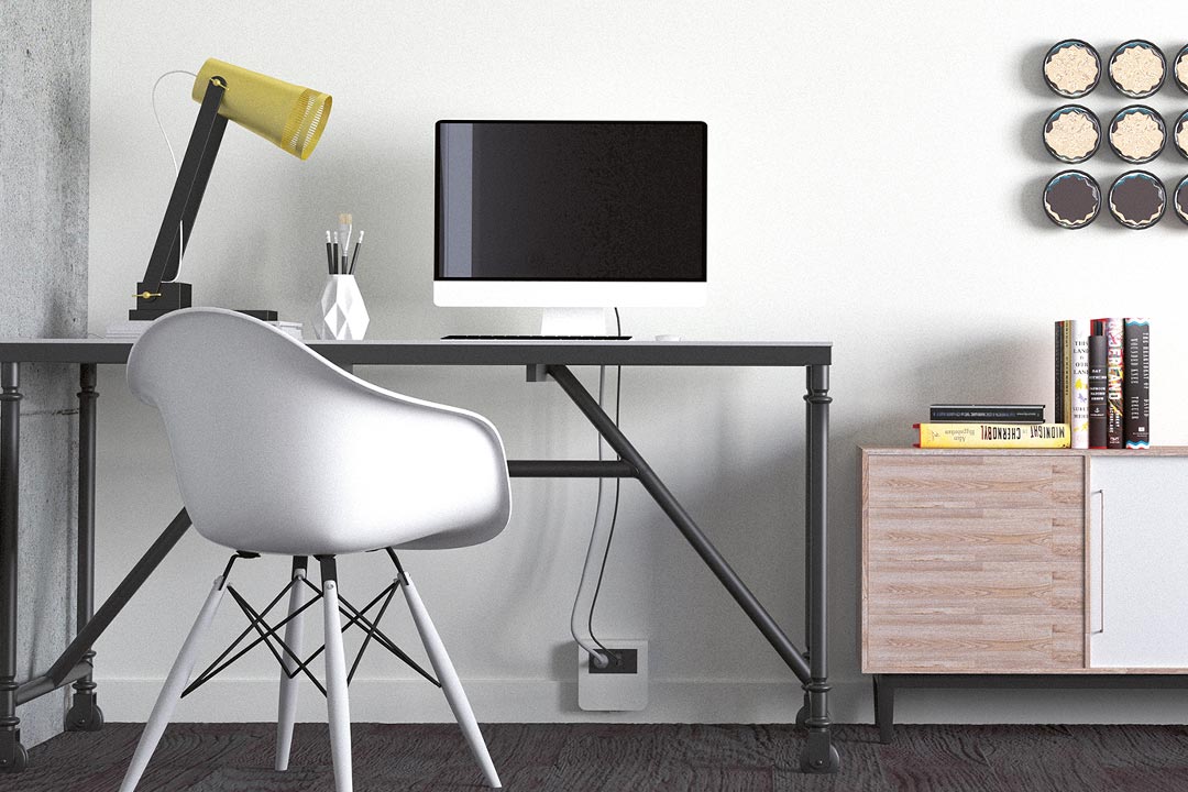 Blick in Büro mit Arbeitsplatz und bodenseitig installiertem Hager tehalit Sockelleistenkanal in Weiß mit Steckdosen-Modul