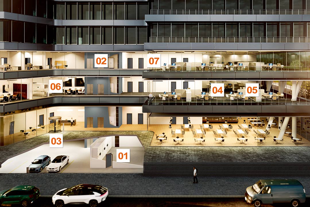 Modell eines großen Bürogebäudes mit Hinweisen zum Lösungsangebot von Hager (Energieverteilung, Türkommunikation, Gebäudesteuerung, Leitungsführung etc.)