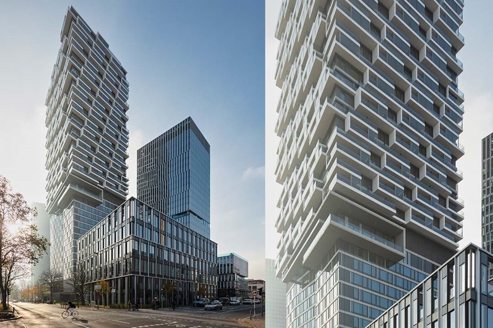 Moderne urbane Architektur mit Hochhaus-Wohn- und Geschäftsgebäuden an einem sonnigen Tag
