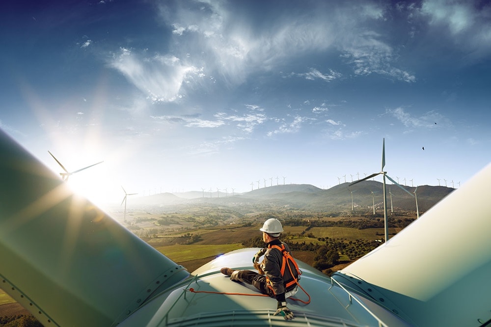 Hager Group Person sitting on a wind turbine