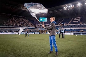 RCSA vs. PSG boy is waving a flag