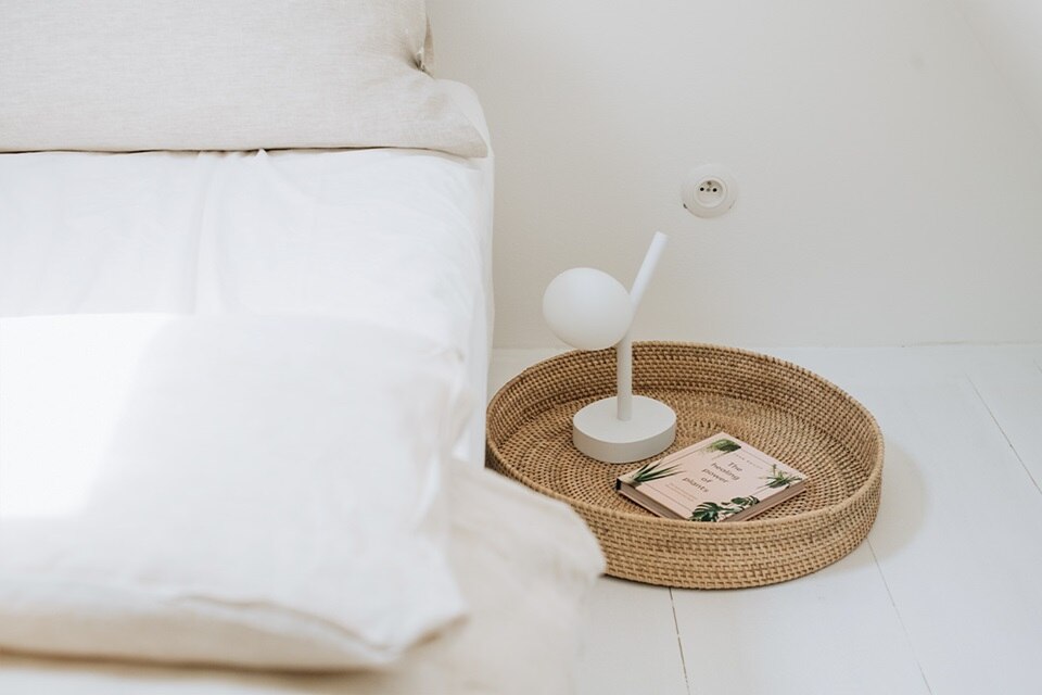 Hager Group Boutique Hotel - Bed with white lap on the right side