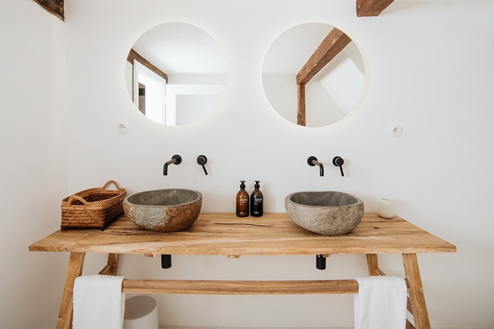 Hager Group Boutique Hotel with rusticalk bathroom made out of wood and stone