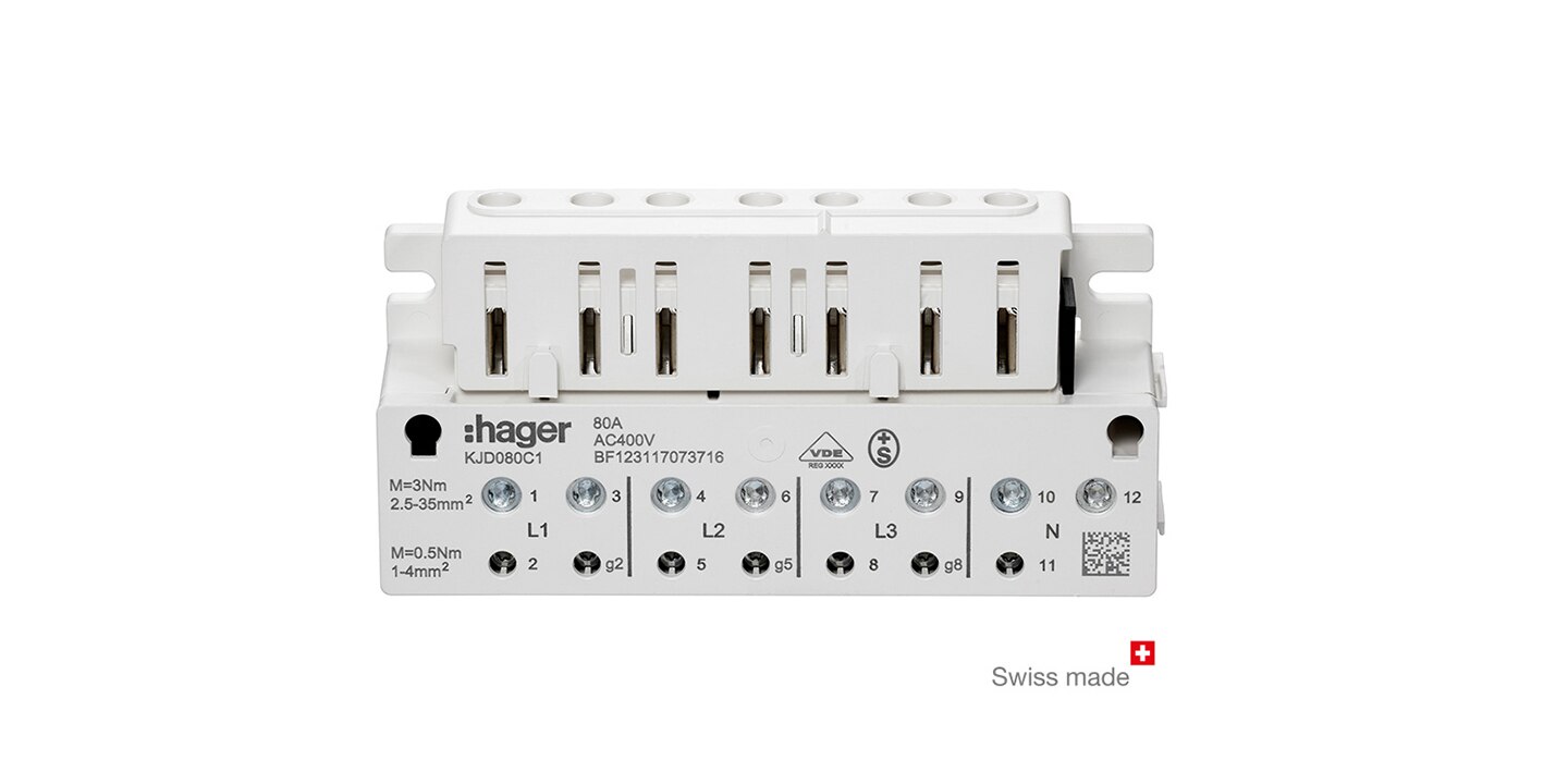 Barre omnibus triphasée Hager 80A 400V avec points de connexion électriques et étiquette de spécifications, fabrication suisse