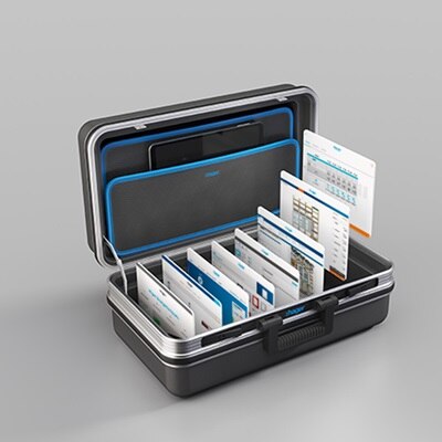 Valise ouverte illustrant la boîte à outils des logiciels, app et web-app Hager pour la distribution électrique tertiaire