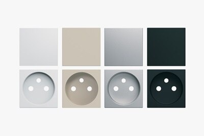 les 4 couleurs d'enjoliveurs gallery de Hager, pure, sable, titane et night