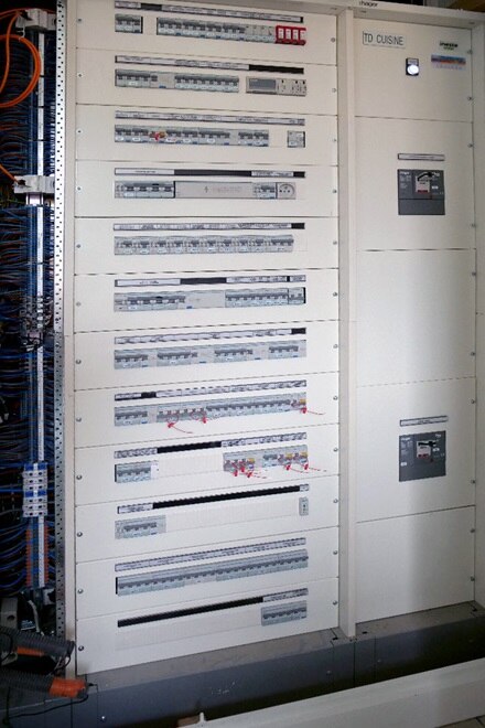 Réalisation chantier Hager, siège social de Soprema, le Grand Charles à Strasbourg, coffret et armoire quadro4 de Hager