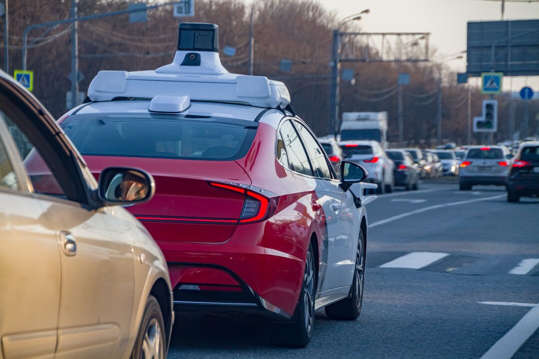 Evening traffic at Trafalgar Square in London