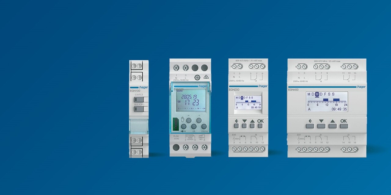 Hager electrical devices line-up on blue background including circuit breakers and energy meters