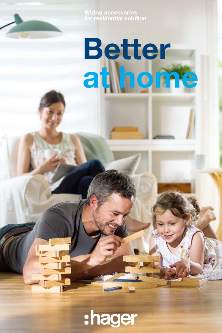 Family enjoying time together at home with Hager's wiring accessories for residential solution