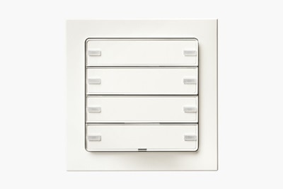 Vista frontale del sensore a pulsante Berker Q.3 KNX a 4 vie con LED di funzionamento e cornice di colore bianco su sfondo neutro