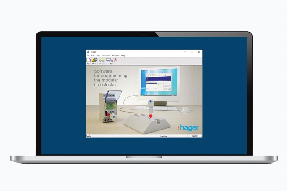 Hager software on laptop screen showing programming interface for modular time clocks