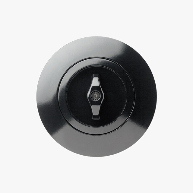 Svart cirkulär väggmonterad roterande dimmerströmbrytare för ljusreglering