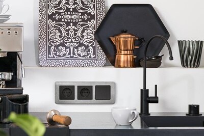 Hager strömbrytare serie Q.7 med ram i rostfritt stål