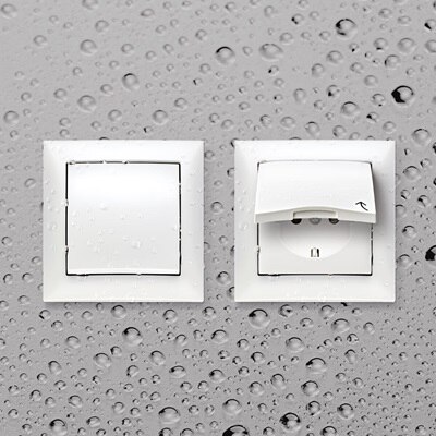 Stänkskyddad strömställare och vägguttag  Berker S.1, IP44