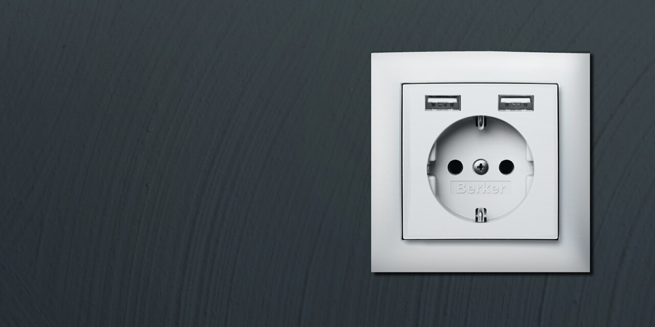Vägguttag med dubbla USB-A i strömställarserie S1 från Hager